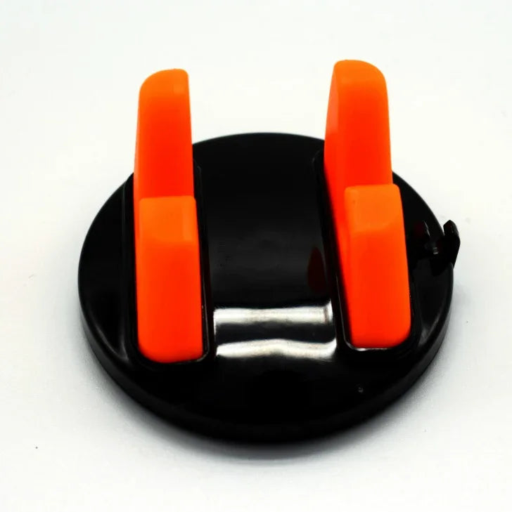 Black and orange plastic phone holder stand for desk or car, compact and sturdy design