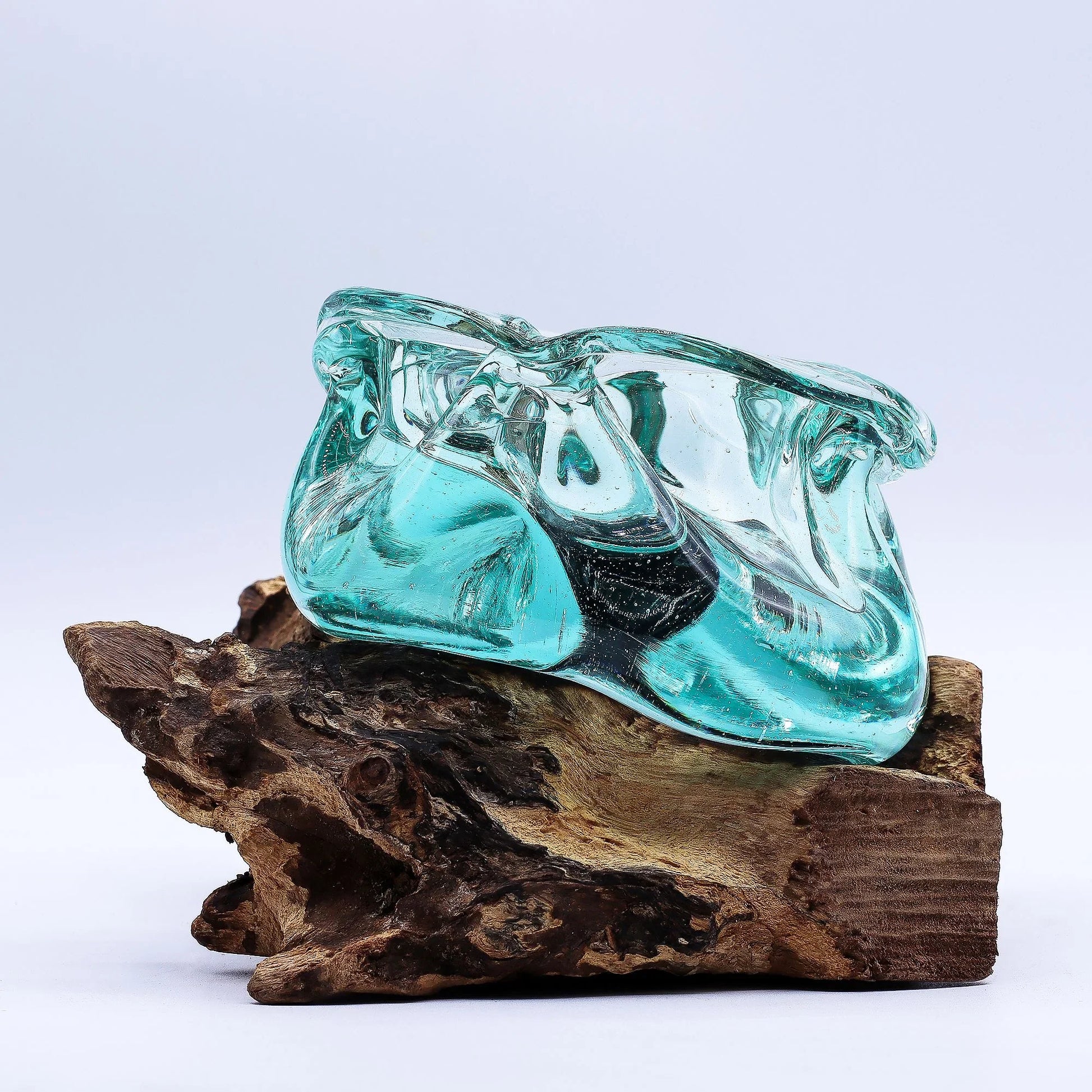 Hand-blown turquoise glass vase on natural driftwood base, home decor accent