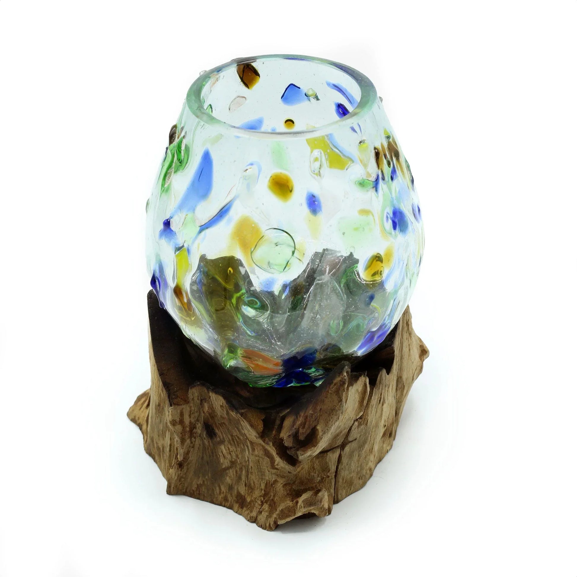 Handcrafted glass vase with colorful accents on natural wood base, home decor accessory