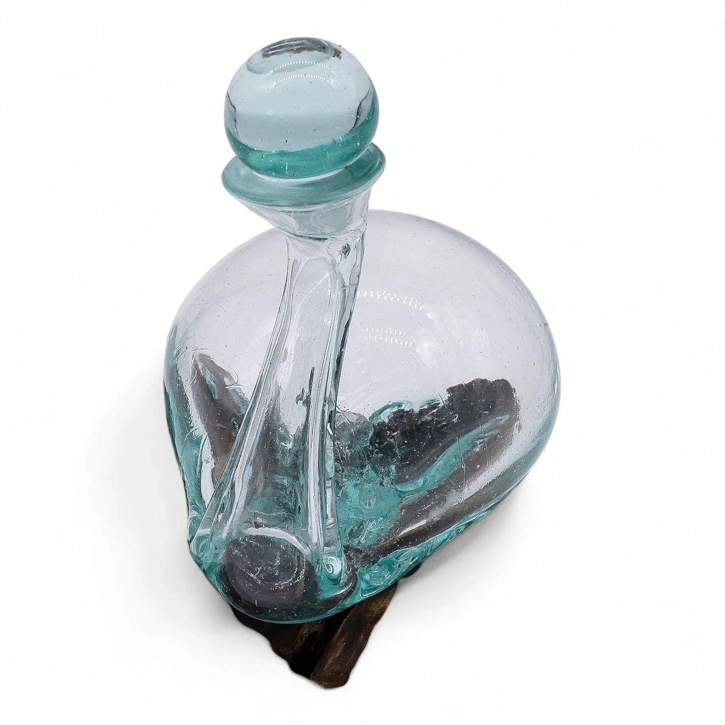 Handcrafted clear glass vase with organic shape on natural wood base, home decor accessory