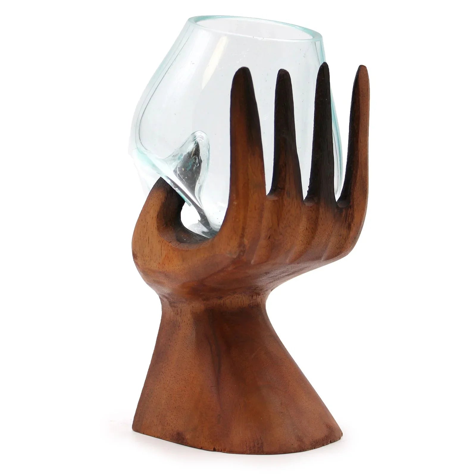 Wooden hand-shaped stand holding curved glass bowl, modern home decor accessory