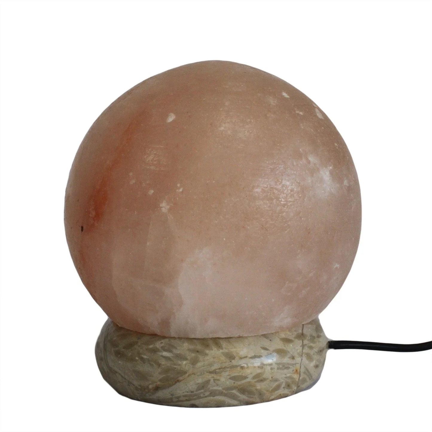 Round Himalayan salt lamp with natural crystal base and power cord