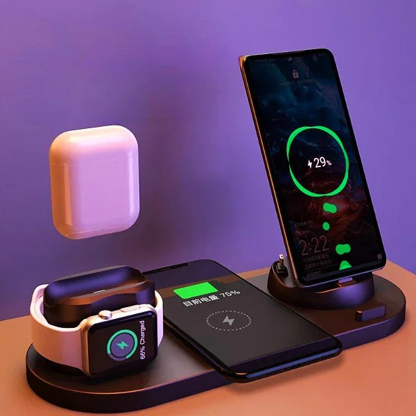 Wireless charging station with smartphone, smartwatch, and earbuds charging on a desk